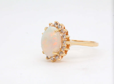 14KY 3.50 Ct Opal and Diamond Ring with .32 Cttw Diamond H in Color an image