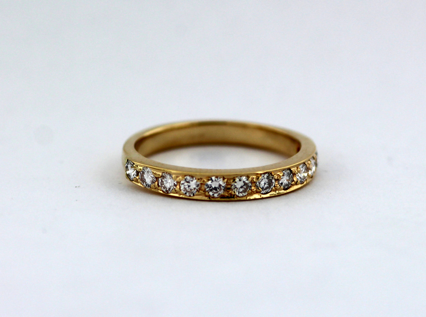 14KW .56 CTTW DIAMOND WEDDING BAND G-VS2