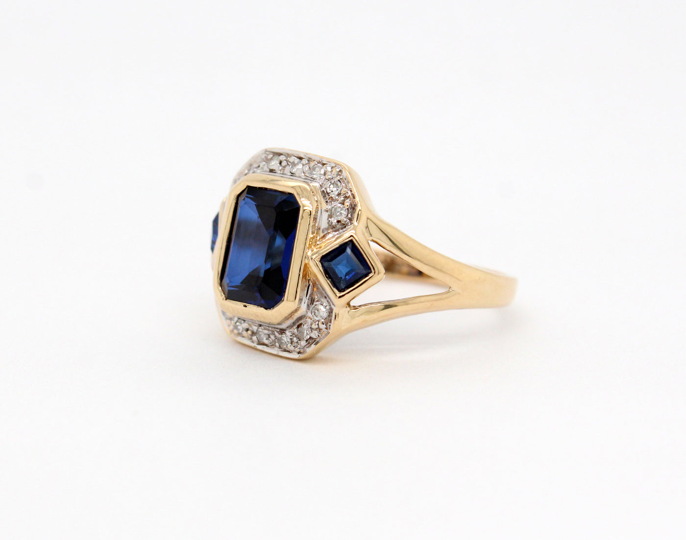 Estate 14KY 2.69 Cttw Synthetic Sapphire and .12 Cttw Diamond Ring