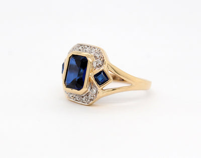 Estate 14KY 2.69 Cttw Synthetic Sapphire and .12 Cttw Diamond Ring
