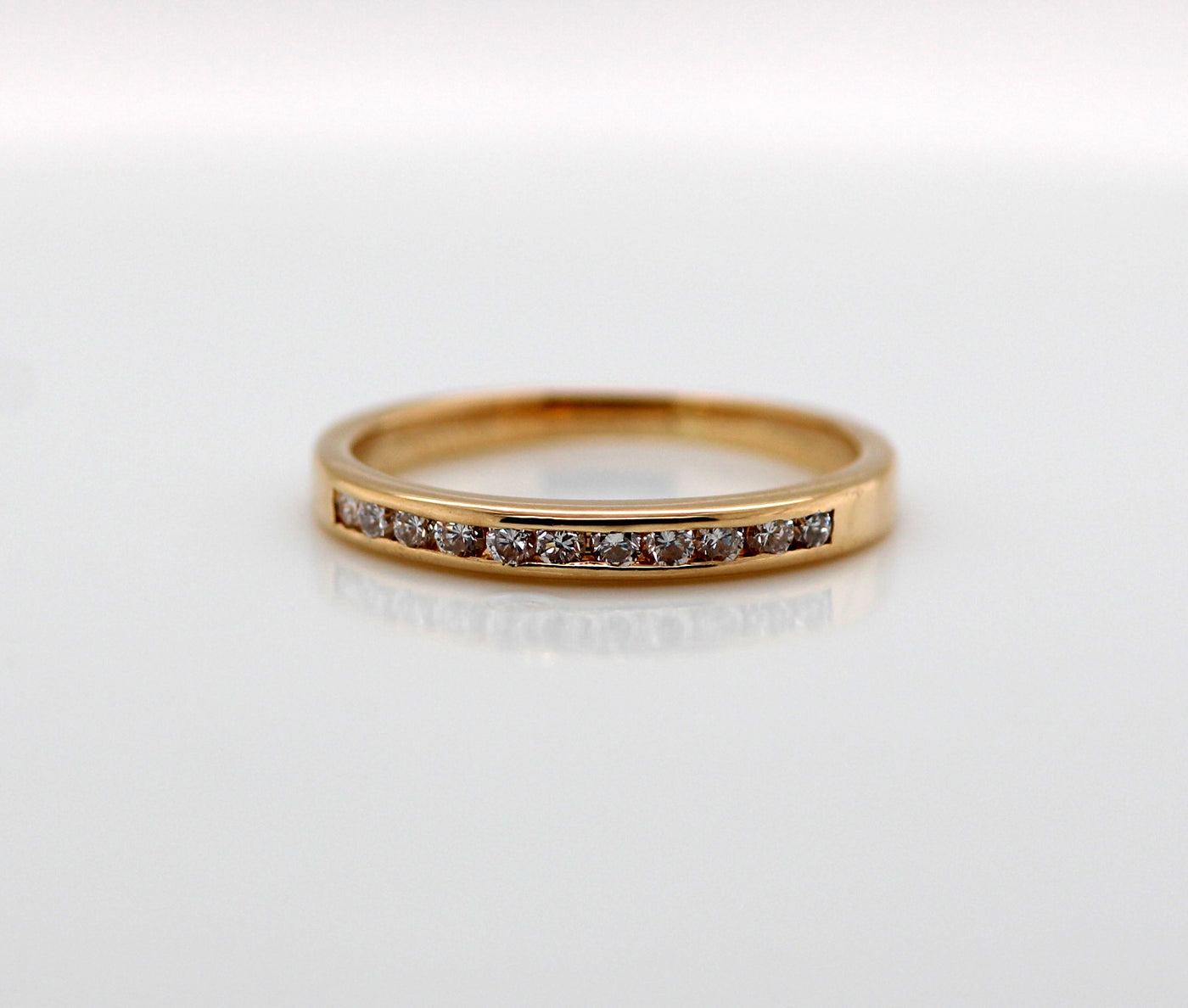 14KY .25 CTTW DIAMOND CHANNEL SET WEDDING BAND H-SI2