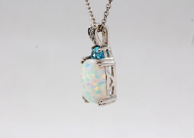 Estate 14KW 1.50 Ct Opal, .25 Ct Blue Topaz and .01 Ct Diamond Pendant