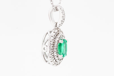 14KW .41 CT EMERALD AND DIAMOND PENDANT, .20 CTTW, H-SI2
