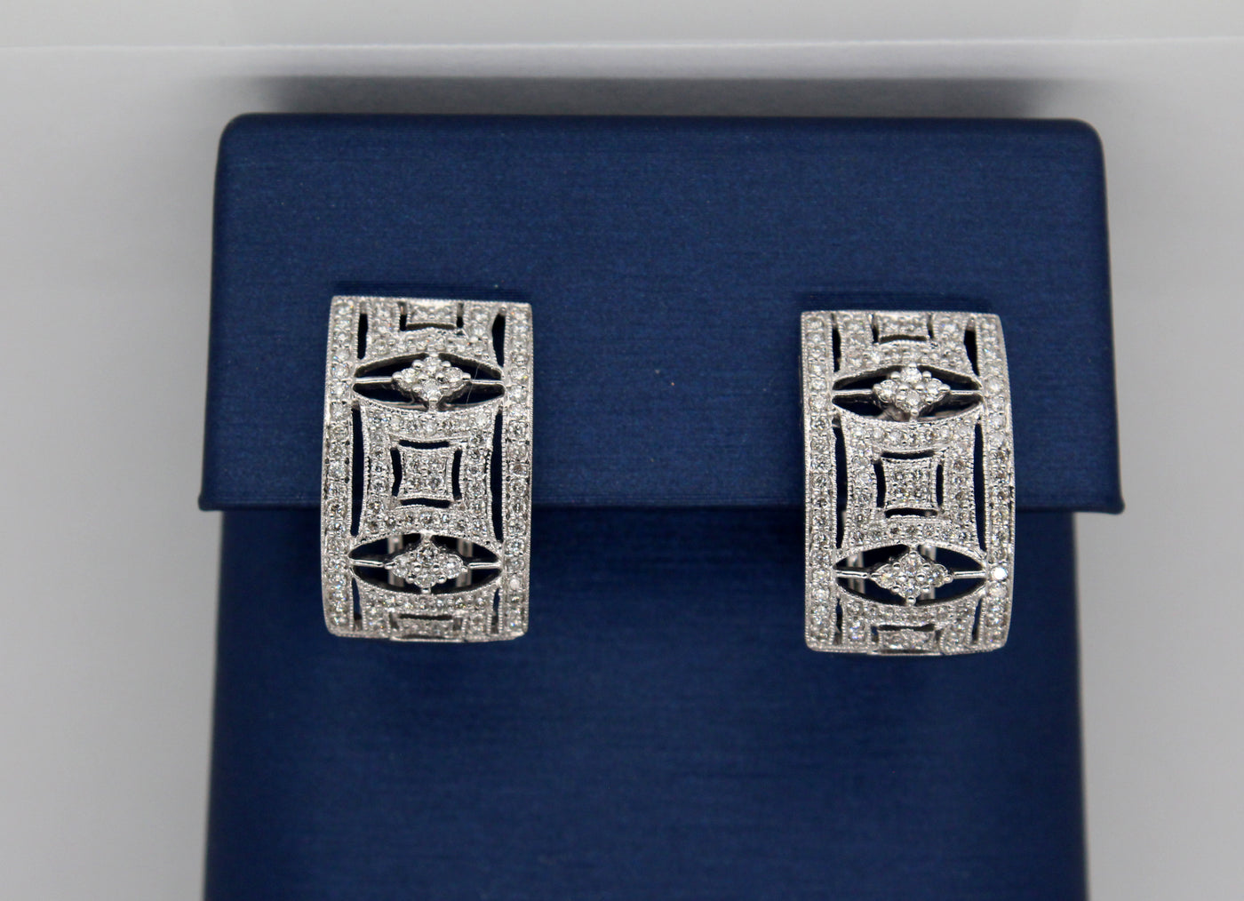 18KW .84 Cttw Diamond Earrings