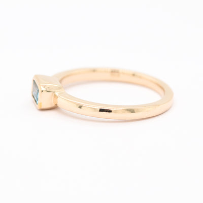 14KY .26 CT EMERALD CUT AQUAMARINE RING