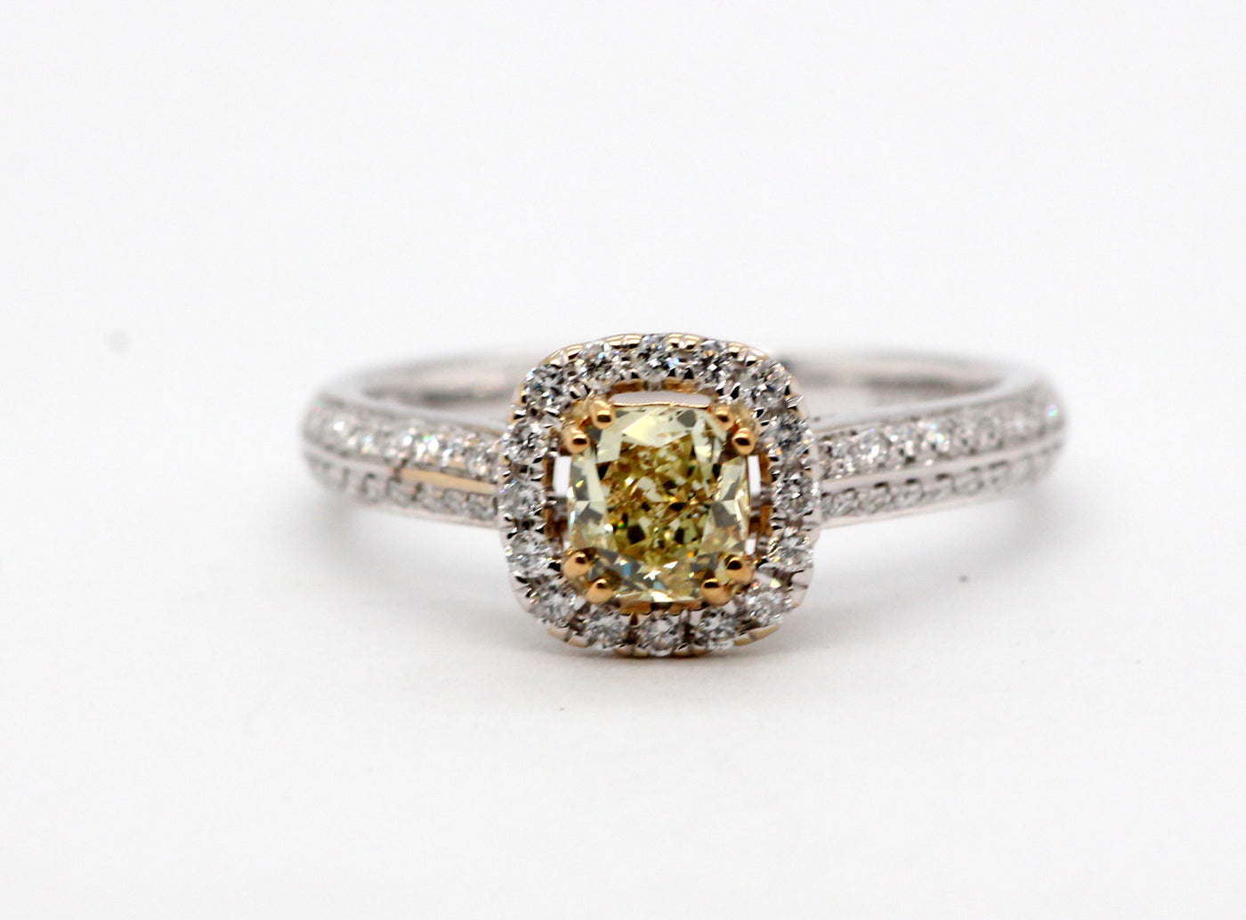 18ky .62 ct yellow diamond and .42 cttw colorless diamond ring