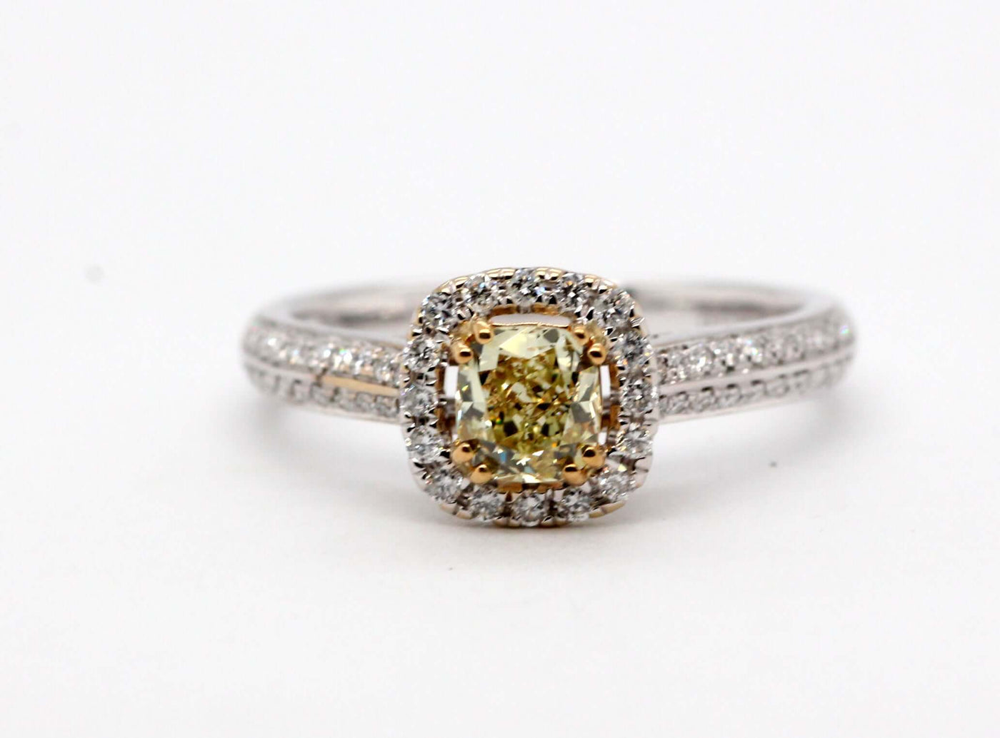 18ky .62 ct yellow diamond and .42 cttw colorless diamond ring