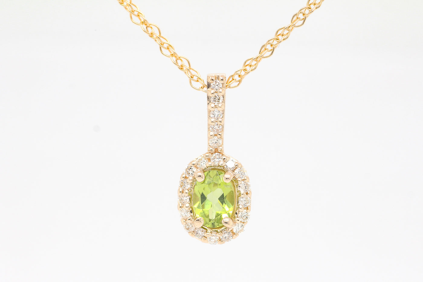 14KY .50  CT PERIDOT AND DIAMOND PENDANT, .17 CTTW GH-SI2