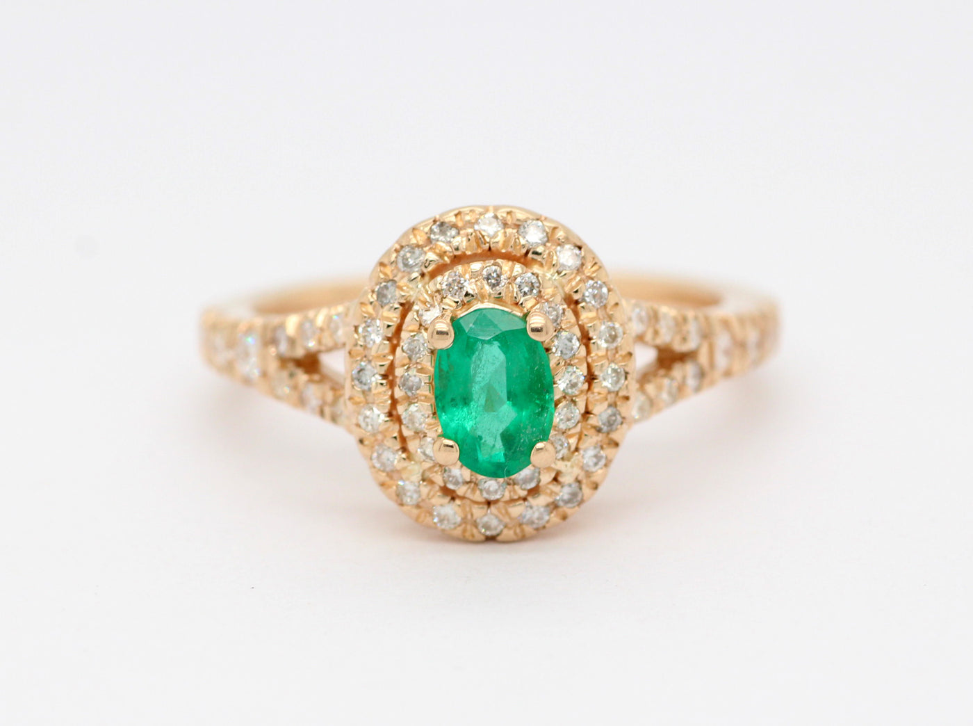 14KY .40 CT EMERALD AND DIAMOND DOUBLE HALO RING, .38 CTTW