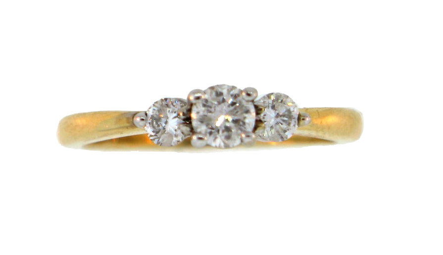 14TT 1/2CT 3 STONE RING