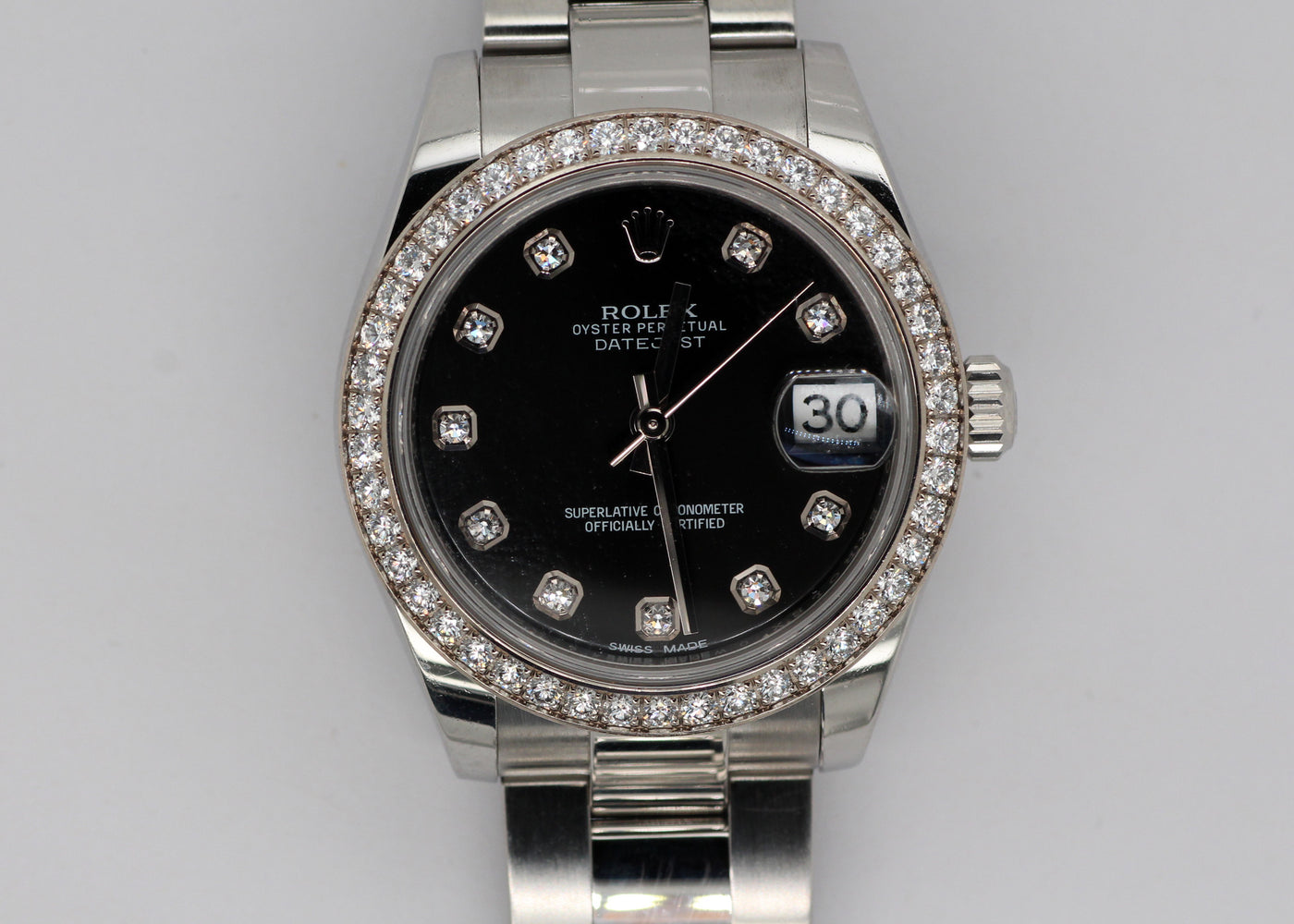 MIDSIZE STAINLESS ROLEX DATEJUST WITH BLACK DIAMOND DIAL AND DIAMOND B