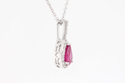 14KW .85 CT RUBY AND DIAMOND PENDANT, .13 CTTW H-SI1