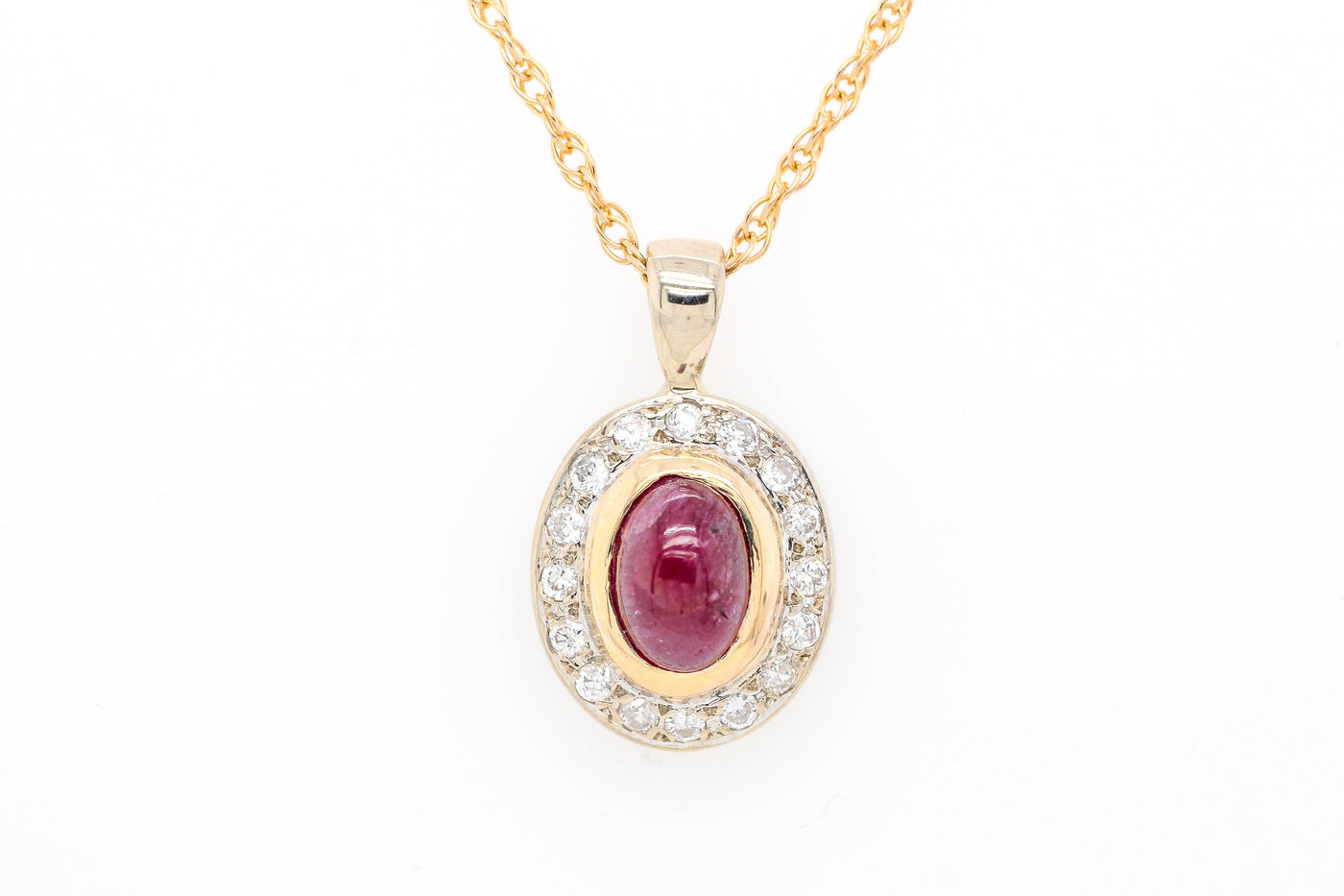 14KY 1.50 CT RUBY AND DIAMOND PENDANT, .16 CTTW H-SI2