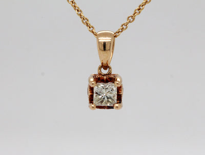 Estate 10KY .28 Ct Princess Cut Diamond and .04 Cttw Ruby Pendant