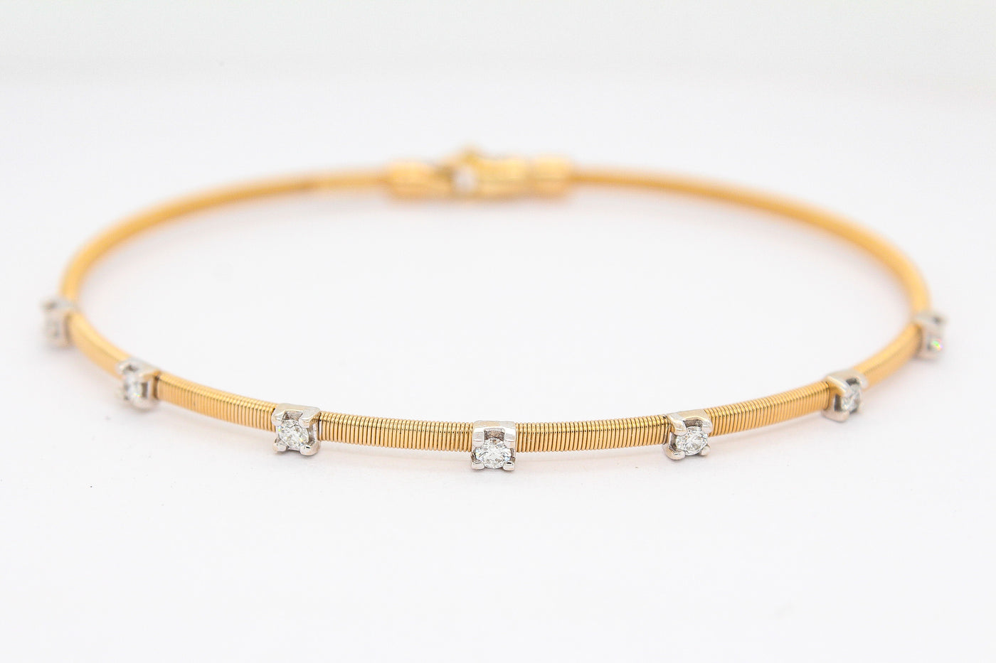 18KTT .25 CTTW DIAMOND BANGLE BRACELET