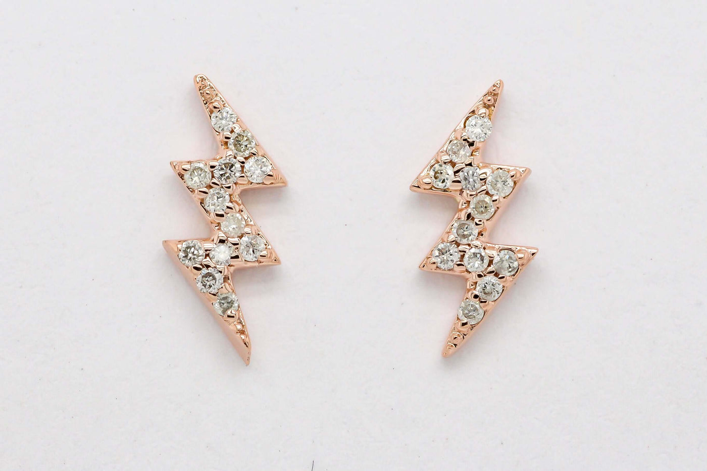 14KR .09 Cttw diamond lightening bold stud earrings