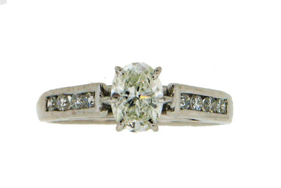 14KW .82CTW DIA BRIDAL RING 
.58CT OVAL CTR J-VS2