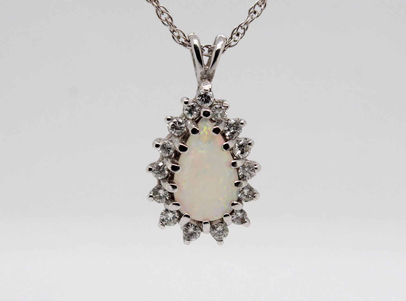 Estate 14KW 1.25 Ct Opal and .53 Cttw Diamond Pendant